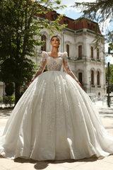 Elegant Long Sleeve Ball Gown Tulle Wedding Dress with Beads